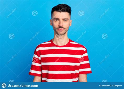 Photo Of Serious Attractive Young Man Wear Striped T Shirt Isolated