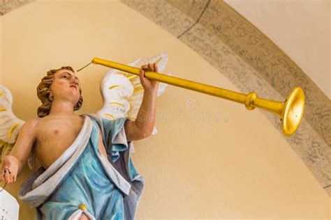 Angel playing the trumpet stock image. Image of gold - 85746089