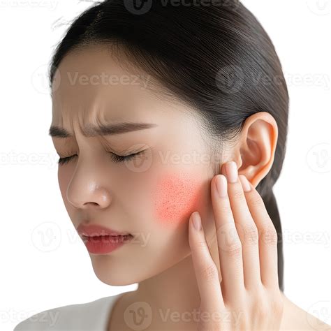 A woman with a pained expression touches her cheek, showing signs of