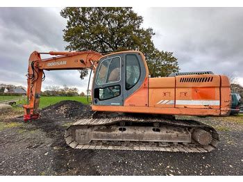 Grävmaskin Doosan DX225LC få timmar Bandgrävare till salu från