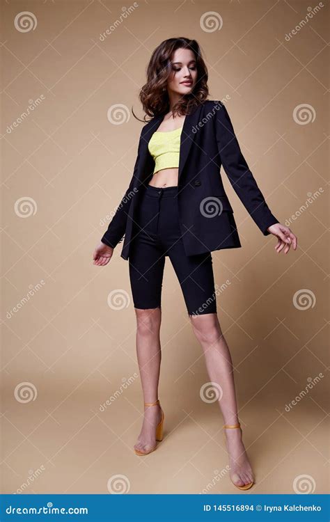 Beautiful Woman Fashion Glamour Model Brunette Hair Makeup Wear Blouse Trousers Skinny Shorts