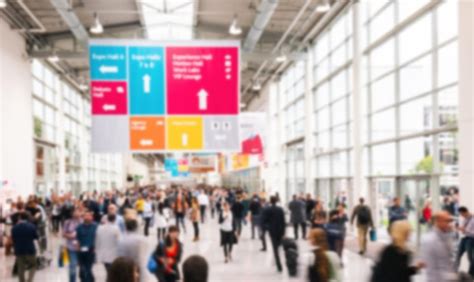 Premium Photo Blurred Business People At A Trade Fair Hall