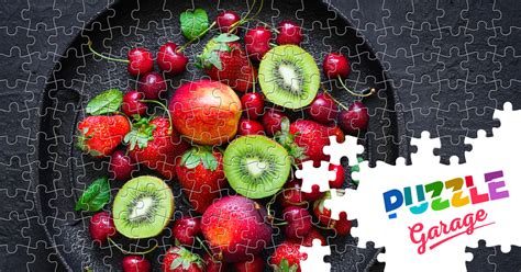 Berries And Fruits On A Black Platter Jigsaw Puzzle Plants Berries