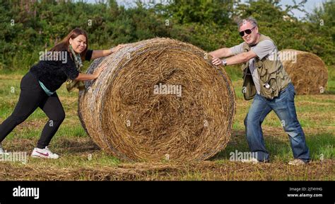 Couple roll in hay hi-res stock photography and images - Alamy