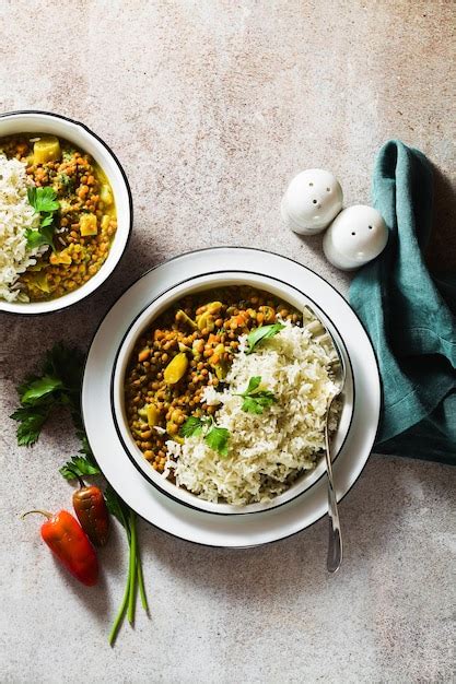 Premium Photo Indian Lentil Dhal With Vegetables And Basmati Rice On