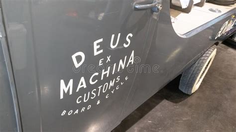 Deus Ex Machina Brand Logo And Sign Text On Custom Car Side Fashion