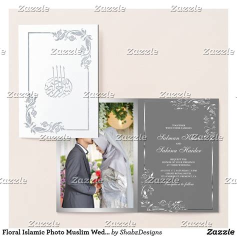 the wedding card is designed to look like it has an elegant design and features a silver foil