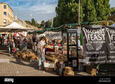 Salamanca Market with stalls in front of the old waterfront sandstone ...