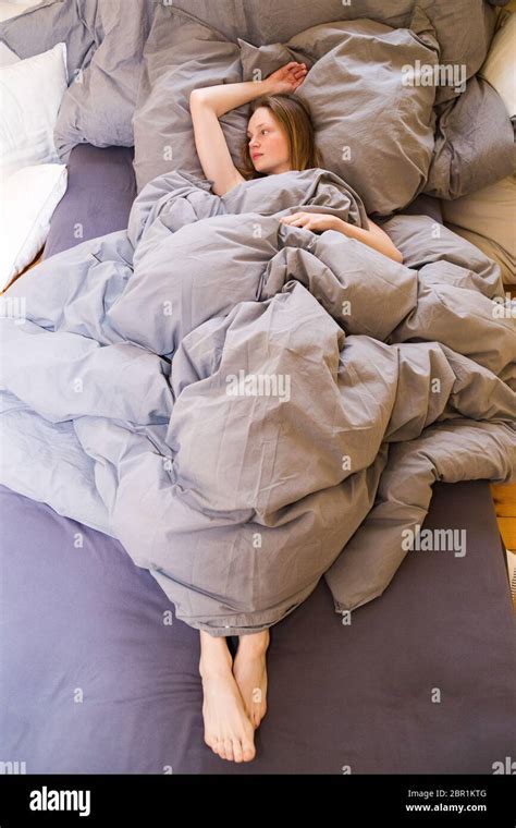 Woman Legs Out Of Bed Hi Res Stock Photography And Images Alamy