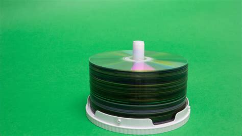 Closeup Stack Compact Discs On Green Stock Footage Video 100 Royalty