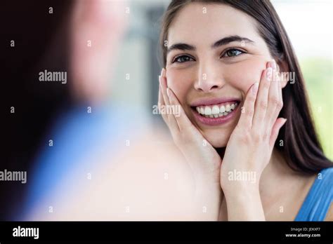 Smiling Brunette In Bathroom Stock Photo Alamy