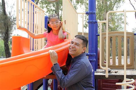 Divorced Dad With His Year Old Brunette Latina Daughter Play In The Park Games And Spend