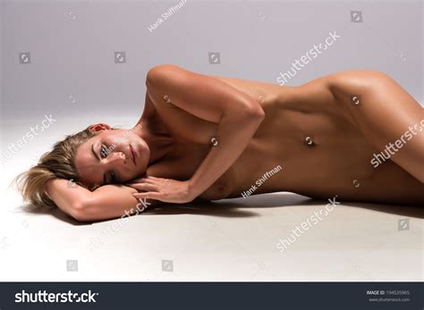 Beautiful Sunburned Brunette Nude On Gray Stock Photo Shutterstock