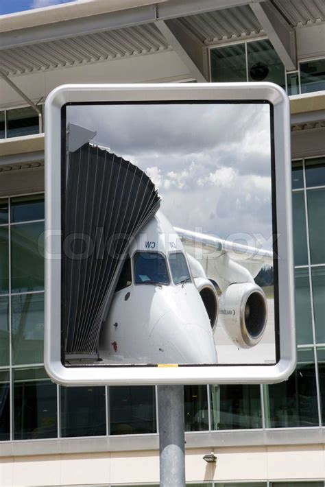 Reflection Of An Airplane In A Mirror Stock Image Colourbox