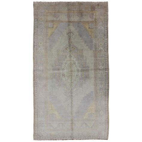 Muted Turkish Oushak Carpet With Center Medallion Design In Grey Sand