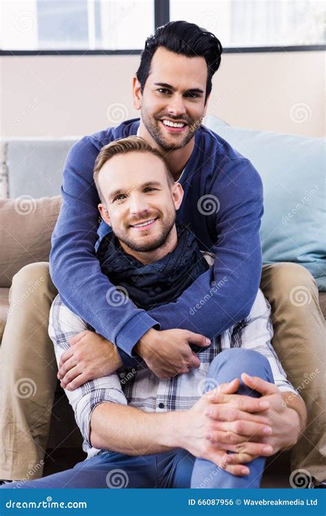 Gay Couple Hugging On The Couch Stock Photo Image Of Caucasian Clothing