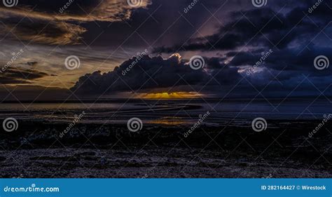 Picturesque Dark Sunset Sky Over The Beautiful Powillimount Beach In