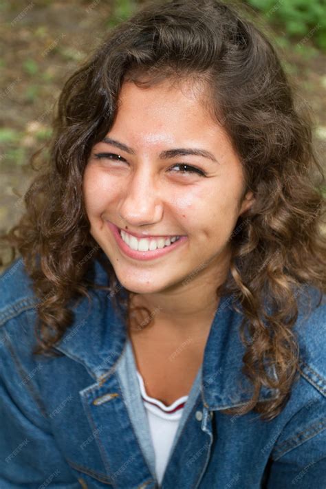 Premium Photo Portrait Of Young Attractive Smiling Woman Wearing