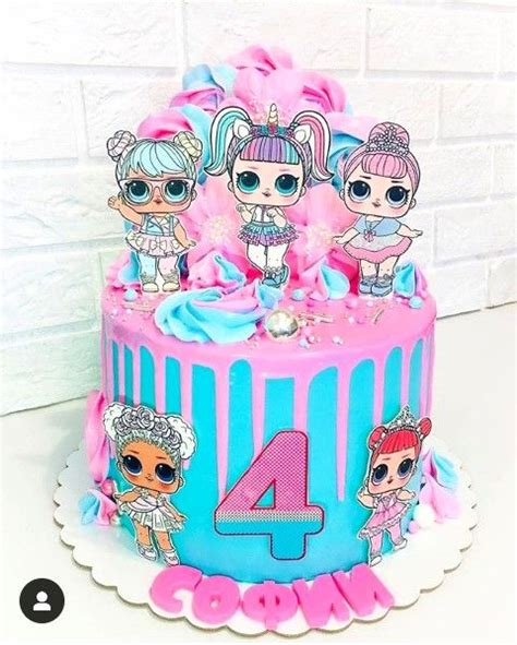 A Pink And Blue Birthday Cake With The Number Four On It S Bottom Tier