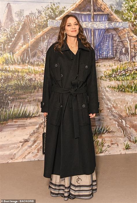 Marion Cotillard Looks Incredible In A Stylish Black Chanel Trench Coat