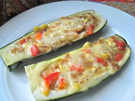 Veggies Spice And Everything Rice Stuffed Zucchini Boats With Melted