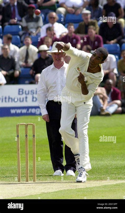 Former West Indian Fast Bowler Michael Holding Bowls During The Malcolm