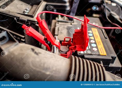 Charging An Empty Car Accumulator With Battery Charger Stock Image