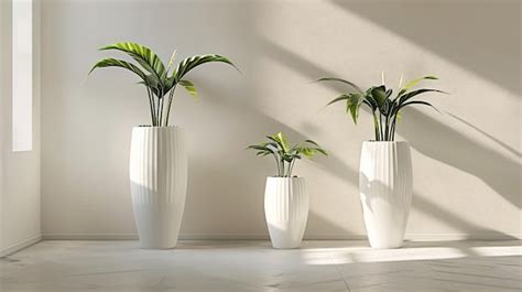 Premium Photo Three White Vases With Green Plants