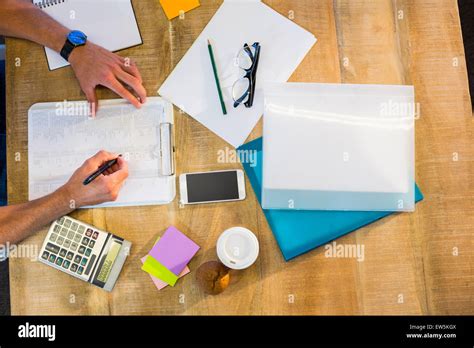 Man Writing On Clipboard Stock Photo Alamy