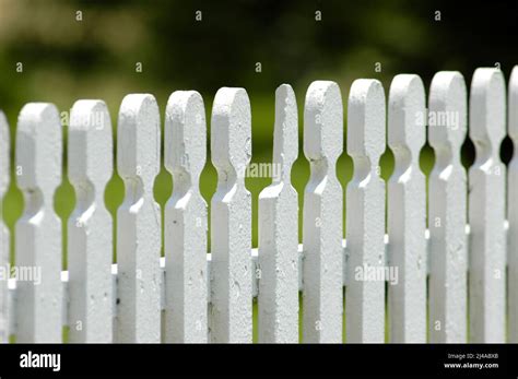 White Painted Fence Old Stock Photo - Alamy