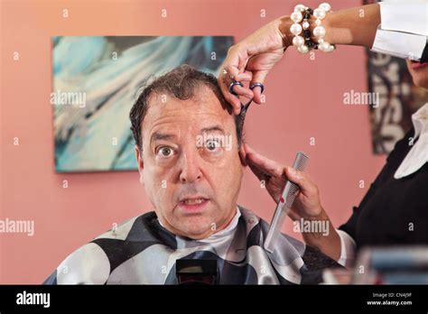 Mature Man Getting A Haircut Stock Photo Alamy