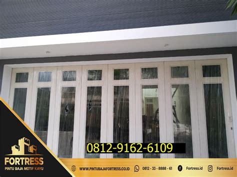 Fortress Model Pintu Garasi Besi Minimalis Jakarta By