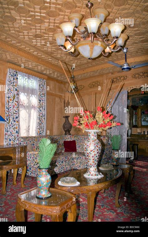 The ornate plushly decorated interior of a typical Houseboat on Dal ...