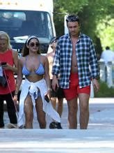 Courtney Green Wears A Blue Bikini As Boyfriend Calum Bushby Takes Photos Of Her On The Beach In