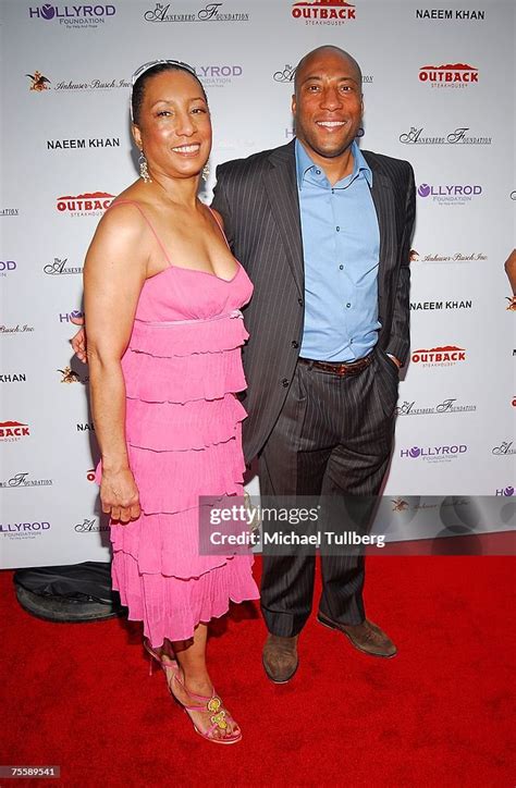 TV host Byron Allen and his mother Carolyn Folks attend the... News ...