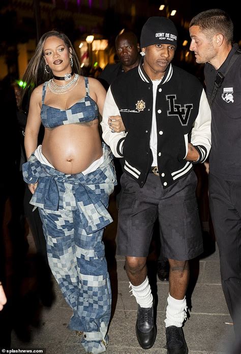 Pregnant Rihanna Shows Off Her Growing Bump In Damoflage Denim And A