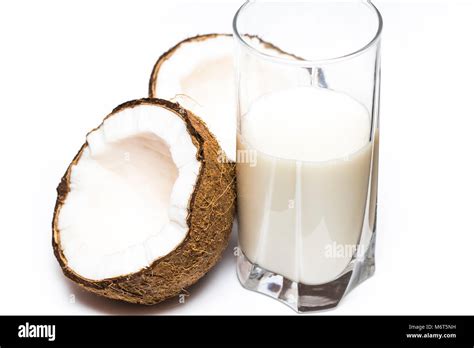 Coconut milk and coconut isolated on white Stock Photo - Alamy