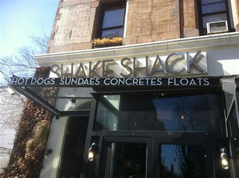 The Front Entrance To Shake Shack With Its Name On It