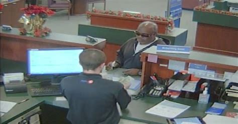 Pd Suspect Sought In Peoria Bank Robbery