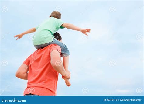 Father Carrying His Son On Shoulders Stock Photo Image Of Parent