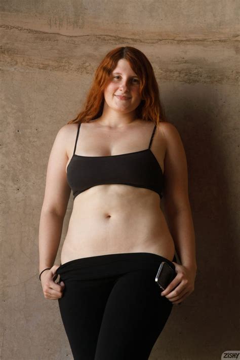 Shy Redhead Bess Burton Reveals Her Tits And Round Ass For Zishy Photos