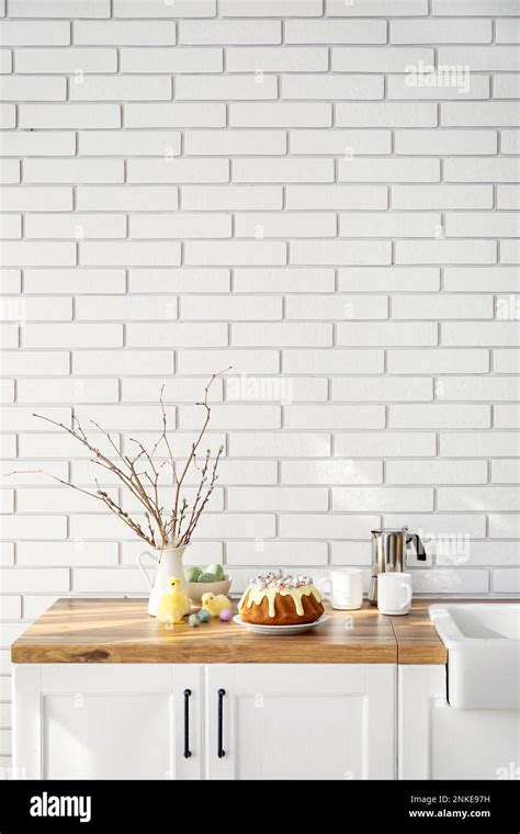 Easter Cake With Painted Eggs Pussy Willow Branches And Baby Chickens On Kitchen Counter Stock