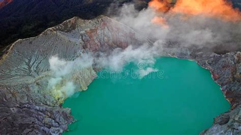 Aerial View Of Rock Cliff At Kawah Ijen Volcano With Turquoise Sulfur