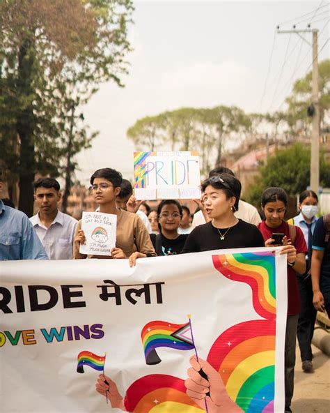 A Group of Young People Walking in a Pride Parade · Free Stock Photo