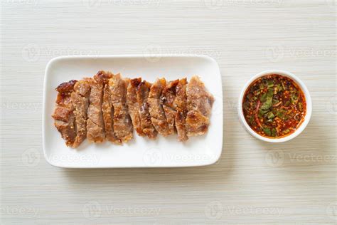 Grilled Pork Neck with Thai Spicy Sauce 4020192 Stock Photo at Vecteezy