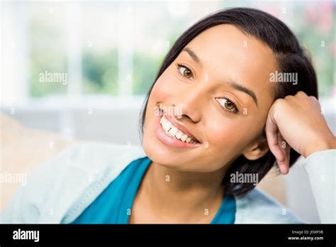 Portrait Of Attractive Brunette On The Sofa Stock Photo Alamy