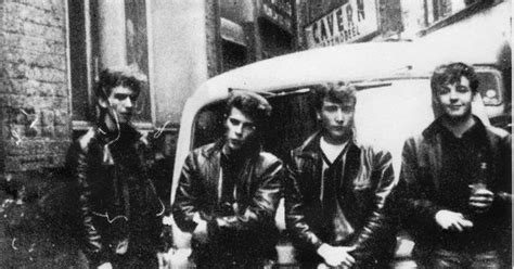 The Original Beatles In Leather Outfits Outside Cavern Meeting