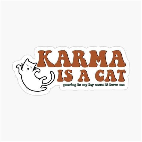 A Sticker That Says Karma Is A Cat