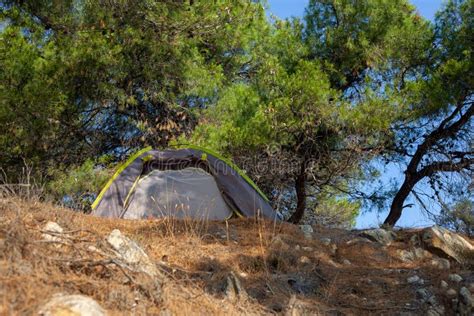 Camping Grey Tent on the Edge of a Cliff Above the Sea Stock Image ...