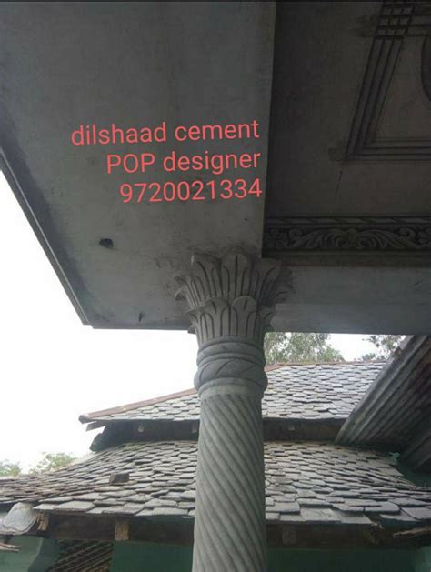 The Top Of A Building With A Sign On It That Says Dishad Cement Pop